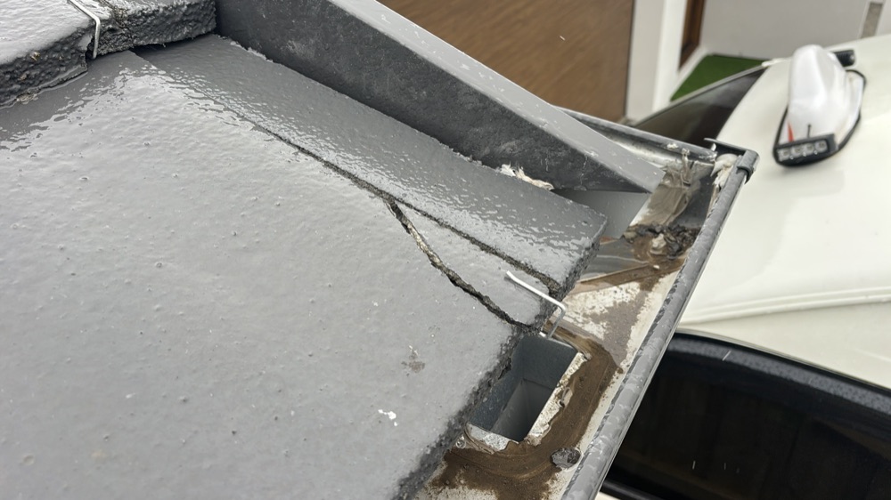 Broken and cracked roof tiles needing replacement, recorded during a pre-handover inspection in Donnybrook