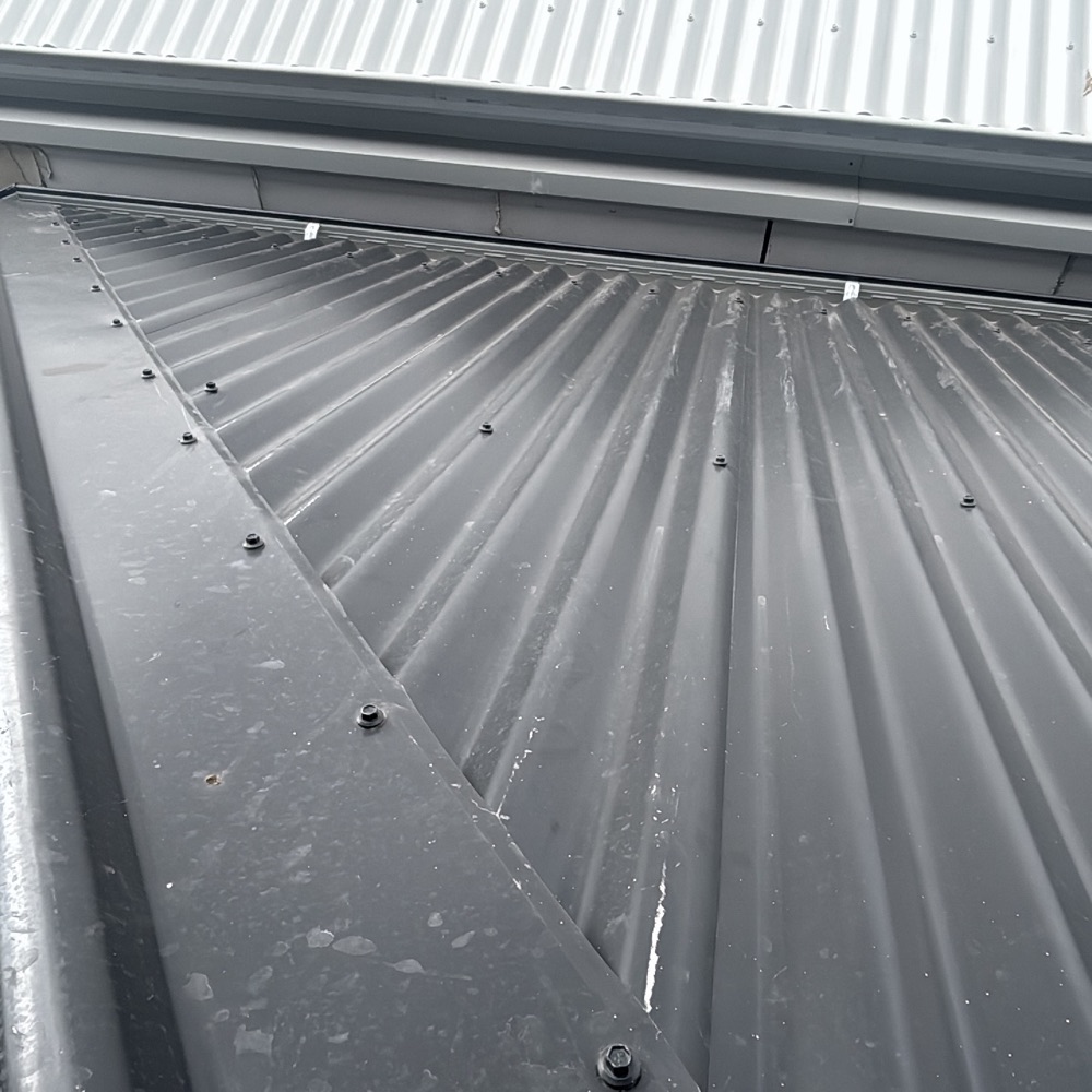 Metal fascia and gutter damaged, dented or scratched, recorded during a fixing inspection in Donnybrook